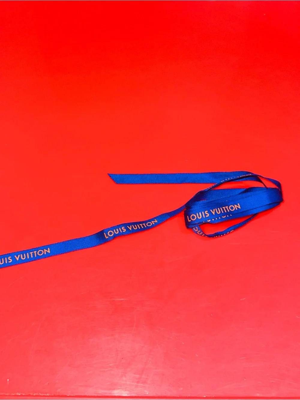 Louis Vuitton Blue Ribbon with Orange Logo Appx 65